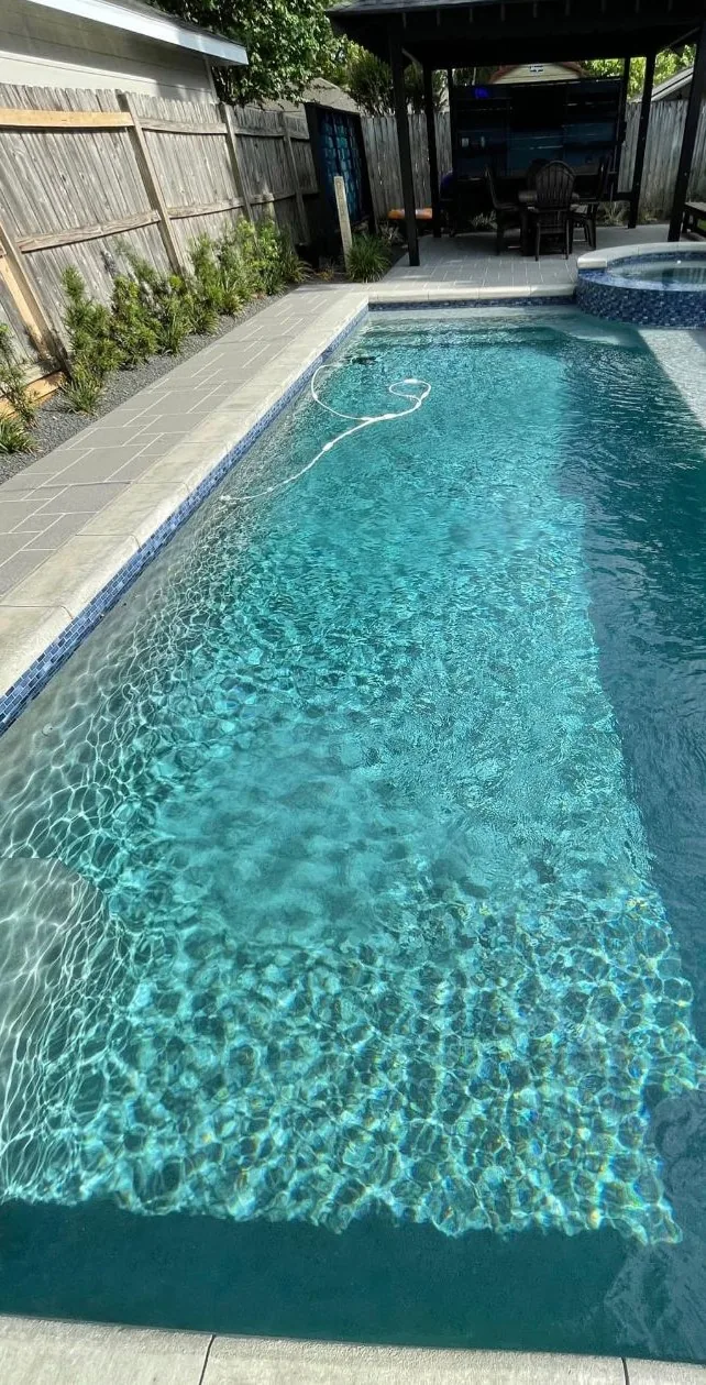 Clear blue backyard pool water in the after half of the supplied comparison
